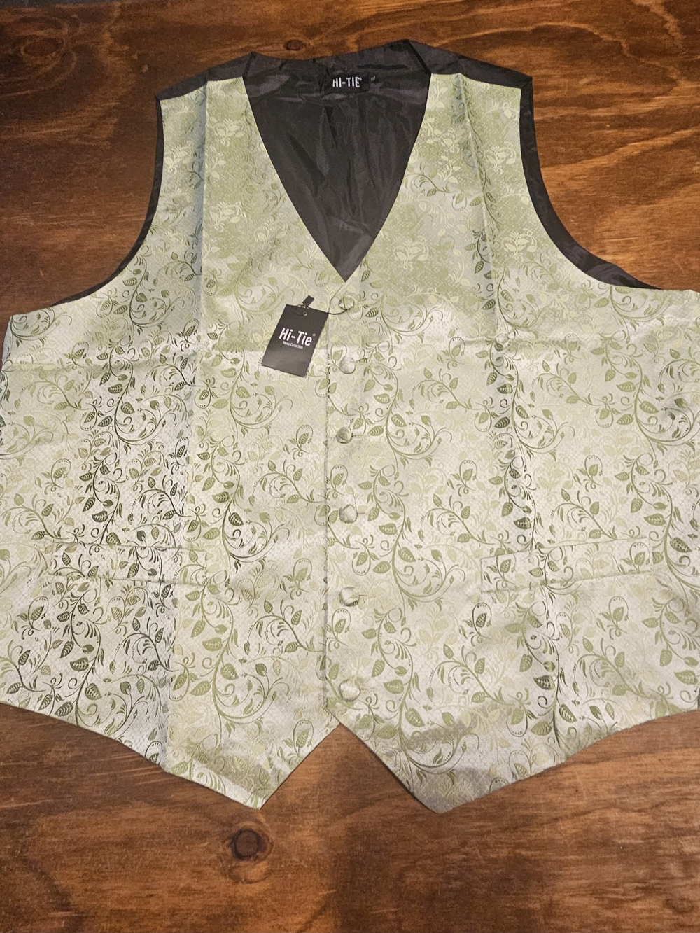 C3, The Hi-Tie Men's Emerald Green Paisley Silk Vest is stylish and sophistica